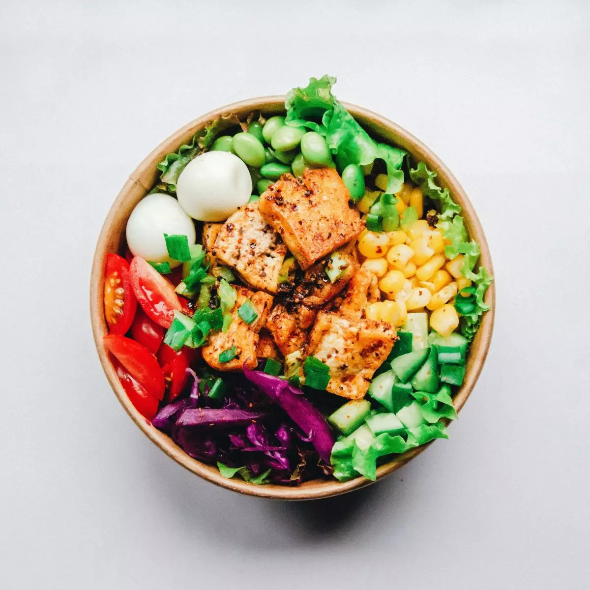 bowl of salads and meat